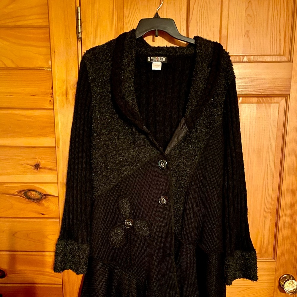 This is a beautiful sweater jacket. The sweater is a 2x plus size. Asking 25.00